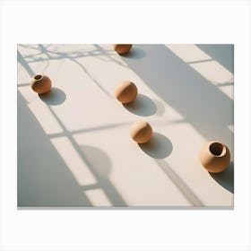 Minimalist Still Life Of Spherical Vases And Spheres Casting Long Shadows On A Beige Surface Under Sunlight Canvas Print