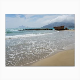 Sandy beach, clouds and the Mediterranean Sea Canvas Print