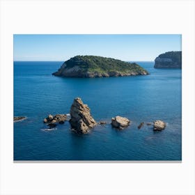 Island, rocks and the blue Mediterranean Sea Canvas Print