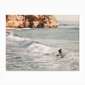 Surfer In Ocean Canvas Print