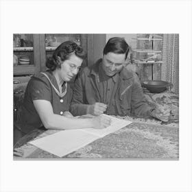 Mr, And Mrs,Lee Wagoner Work On Farm Records, They Live On The Black Canyon Project, Canyon County, Idaho By Canvas Print