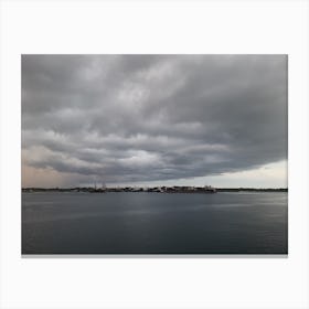 Storm Clouds Over The Water Canvas Print