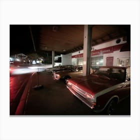 Old red cars and street lights Canvas Print