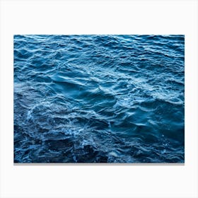 Dark blue sea water with a wavy surface Canvas Print