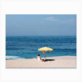 The Yellow Parasol The Blue Sea And The Woman At The Beach Portugal Travel Canvas Print