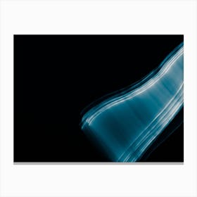 Glowing Abstract Curved Blue And White Lines Canvas Print