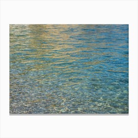 Clear sea water and reflections on the beach Canvas Print