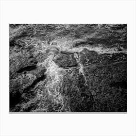 White Sea Foam And Black Rocks Surface Canvas Print