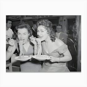 Mirv Arvinen Miss Finland 1955 And Sohos Fair Queen Andria Loran Try Their Hand At Scoffing A Plate Of Pasta At The Soho Fair Spaghetti Eating Canvas Print