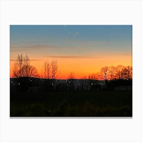 Sunset Over A Field Canvas Print