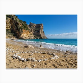 Beach, cliffs and Mediterranean Sea. Cala Moraig Canvas Print