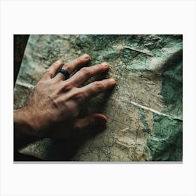 Man'S Hand On A Map 1 Canvas Print