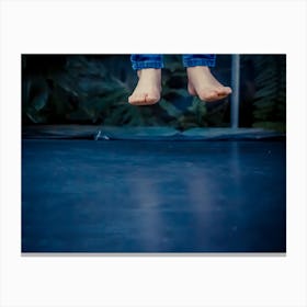 Legs Floating In The Air After Jumping On The Trampoline Canvas Print