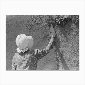 Spanish American Woman Plastering Adobe House, Chamisal, New Mexico By Russell Lee Canvas Print