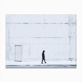 Person Walking In The Snow Canvas Print