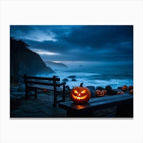 Coastline Celebration Captured At Dusk A Single Jack O Lantern With A Carved Face Glowing Eerily On (1) Canvas Print