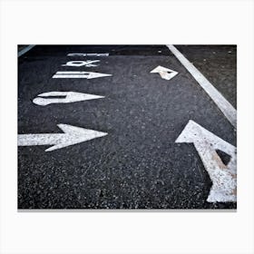 Chalk Drawn Directional Arrows And Markings Bold And Simple On An Aged Sidewalk Surface Partially (6) Canvas Print