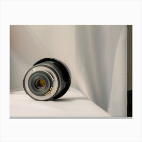 Black Camera Zoom Lens On White Cloth Canvas Print