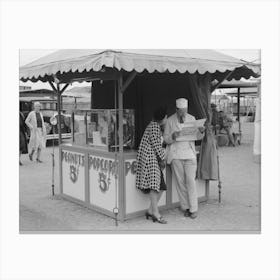 Popcorn Man And His Wife Studying The Map, County Fair, Gonzales, Texas By Russell Lee Canvas Print