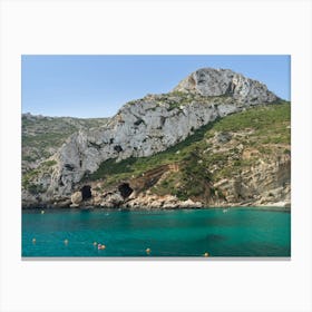 Cliffs of the Cala de la Granadella bay Canvas Print