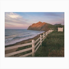 wonderful view of the sunset on a quiet beach Canvas Print