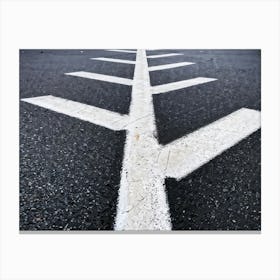 Chalk Drawn Directional Arrows And Markings Bold And Simple On An Aged Sidewalk Surface Partially (2) Canvas Print