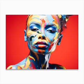 Beautiful Woman With Colorful Paint On Her Face Canvas Print