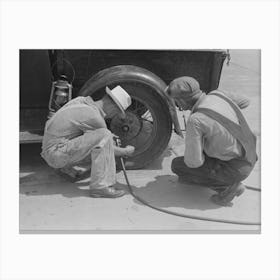 Migrants On The Road Checking Tires At Filling Station Near Henrietta Oklahoma By Russell Lee Canvas Print