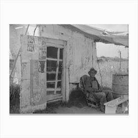 Resident Of Tin Town Sitting In Front Of His Shack Home, Caruthersville, Missouri By Russell Lee Canvas Print