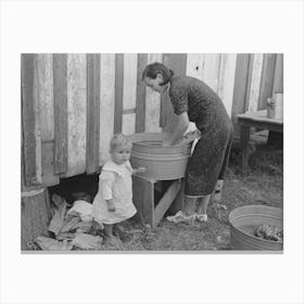 Farmer S Wife Washing Clothes And Watching Son At Same Time, Note Construction Of House Canvas Print