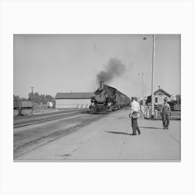 The Morning Train Comes Into Montrose, Colorado By Russell Lee Canvas Print