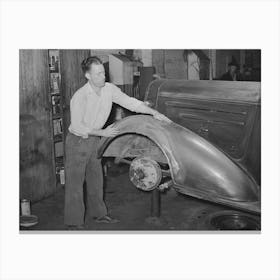 Refinishing Fender On Automobile In Garage, San Augustine, Texas By Russell Lee Canvas Print
