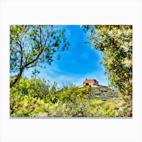 Path to the Red Fortress. A winding path leads through a rugged, green-dotted landscape to a striking red fortress perched atop a hill, blending history with natural beauty under a vivid blue sky. 1 Canvas Print