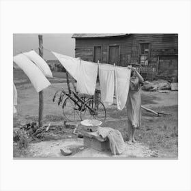 Daughter Of Tenant Farmer Hanging Up Clothes Near Warner, Oklahoma By Russell Lee 1 Canvas Print