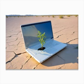 Laptop In A Dry Cracked Desert With A Green Plant Growing Out Of Its Keyboard Canvas Print