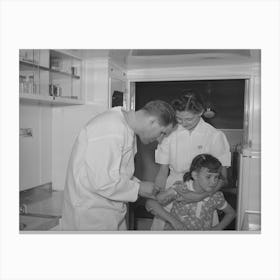 Doctor And Nurse With Little Girl In Trailer Clinic At The Fsa (Farm Security Administration) Migratory Labor Camp Canvas Print