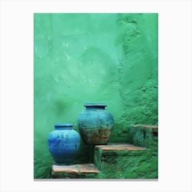 Two Blue Vases On A Green Wall Canvas Print