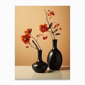 Two Black Vases With Orange Flowers Canvas Print