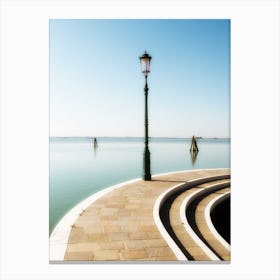 Lone Lamp Post By The Lagoon Canvas Print