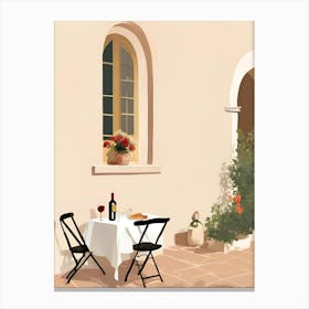 Table And Chairs On A Patio Canvas Print