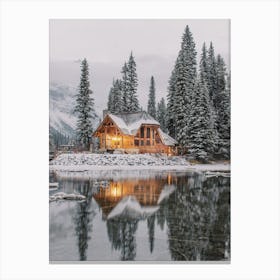 Cabin On Frozen Lake Canvas Print