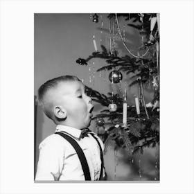 Boy With A Christmas Tree, Blowing Out Candle, Vintage Black and White Old Photo Canvas Print