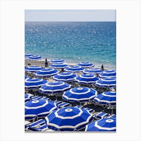 Blue Umbrellas On The Beach of Nice Canvas Print