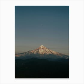 Little Airplane Flying over Mountain Peak Canvas Print