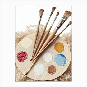 A Palette With Paintbrushes Canvas Print