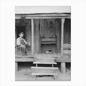 W E Smith, Farmer Near Morganza, Louisiana, Sitting On The Front Porch Of His Home By Russell Lee Canvas Print
