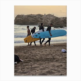 Surfers On The Beach Canvas Print