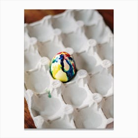 Colorful Egg In An Egg Carton Canvas Print