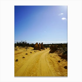 Dirt Road In The Desert With Dark Shadows And Sky Vignetting Canvas Print