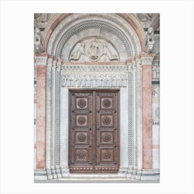 Wooden Door Of A Church In Tuscany in Italy Canvas Print